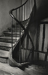 Black and white photo of a Parisian stair on rue de la Huchette in the Left Bank in the 5th arrondisement of Paris, France