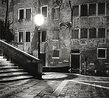 Black and white photo of the Campo San Boldo and bridge in the San Polo sestiere of Venice, Italy