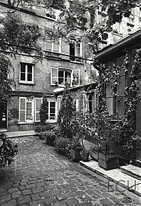 Black and white photo of a Parisian courtyard off rue St. Jacques on the Left Bank in the 5th arrondisement, Paris, France