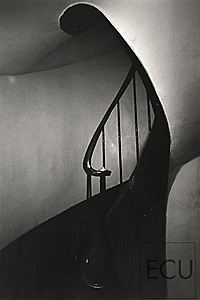 Black and white photo of a Parisian stair on rue Chanoinesse east of Notre Dame on Ile de la Cité in Paris, France