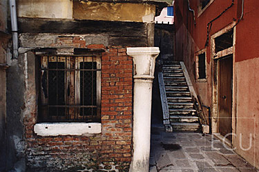 Color photo of an obscure campo and the cubistic character of Venetian architecture created by multiple perspectives which one sees throughout Venice, Italy