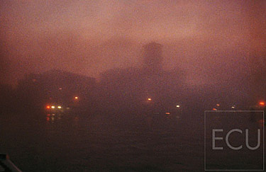 Color photograph of Laguna from vaporetto heading to Fondamenta Nouve in winter in fog at sunset in Venice, Italy rendered in an impressionistic style