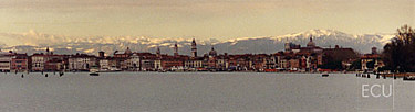Color photo of the Italian alps with snow photographed from the Laguna in winter in Venice, Italy